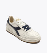 B. ELITE Dominio | White/Peacoat | DIADORA