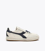B. ELITE Dominio | White/Peacoat | DIADORA